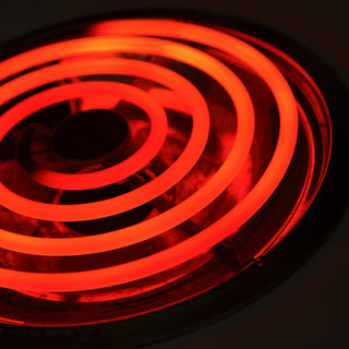 glowing red stove top coil element