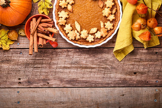 Wood table with pumpkin pie