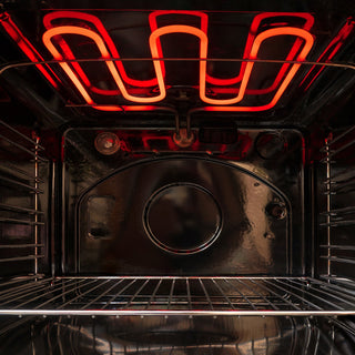 view of illuminated oven element inside an oven