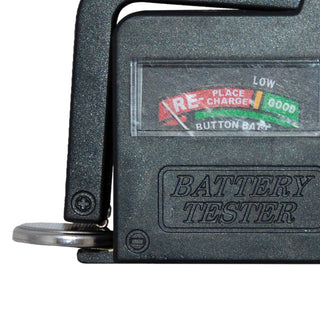 Battery tester with label indicating battery status on a white background