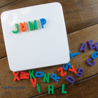 Four pack white square metal burner covers used for educational purposes with alphabet magnets. Magnets not included