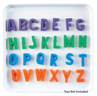 Underside of one of the square burner covers storing alphabet magnets. magnets not included. 