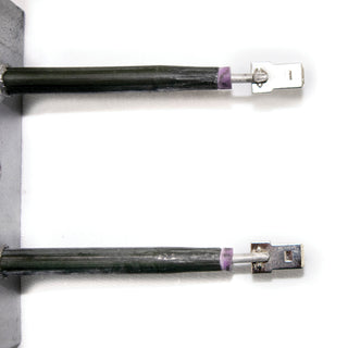 up close view of connectors for oven element on white background