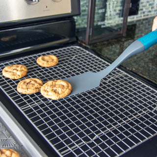 taste of home nylon turner placing cookies on nonstick cooling rack