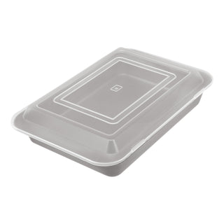13 x 9-inch cake pan with plastic travel cover on white background.