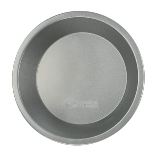 overhead view nonstick metal pie pan on white background