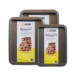 large, medium and small nonstick baking sheets with packaging on white background