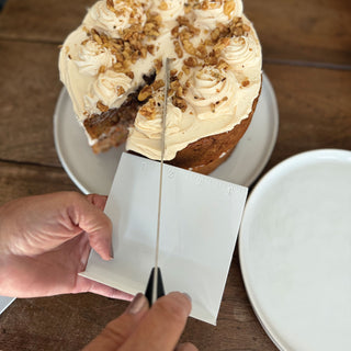 using the cake saver-server ruler to portion out the servings before slicing cake
