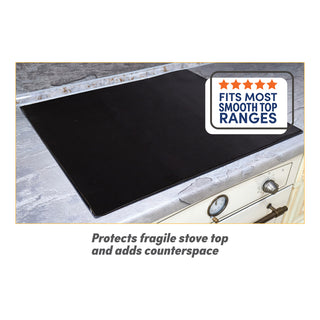 Black stove mat on a stovetop with text indicating it fits most smooth top ranges and protects fragile stove tops.