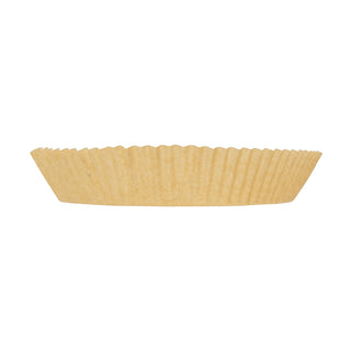 side view of round parchment air fryer liner on white background
