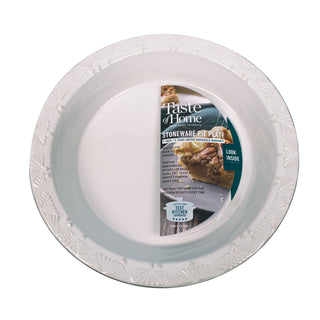 White pie dish with 'Taste of Home' packaging on a white background