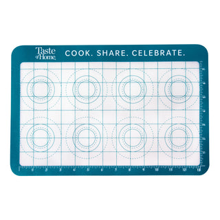 Baking mat with grid and circle templates on a white background, featuring 'Taste of Home' branding.