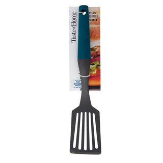Taste of home slotted spatula in packaging on white background