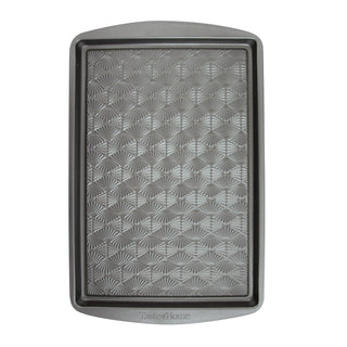 15 x 10-inch Taste of Home nonstick metal baking sheet on white background.