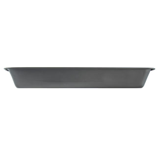 Taste of Home 13 by 9 inch nonstick metal baking pan on white background showing profile view
