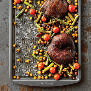 Roasted mushrooms and vegetables on a Taste of Home Baking Sheet